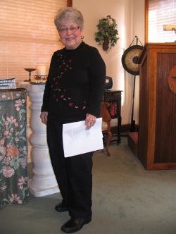 Service Leader, introduces Sunday sermon